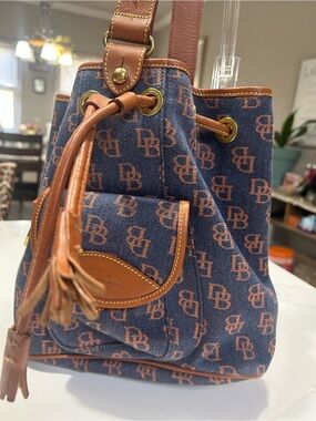 Dooney & Bourke Blue and Brown Logo Drawstring Bucket Bag